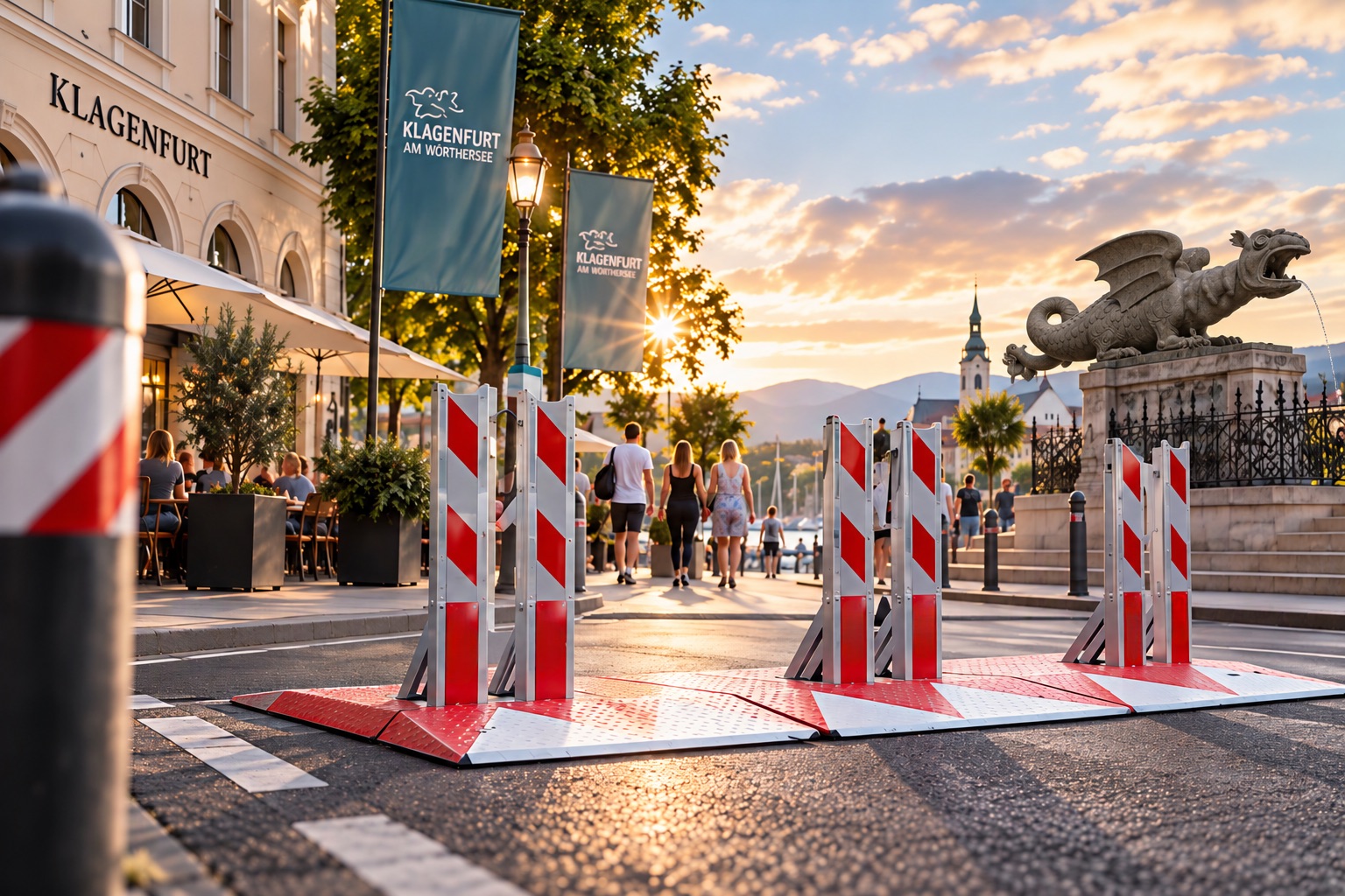 Mobile Fahrzeugsperren auf einer Straße in Klagenfurt am Wörthersee beim Lindwurmbrunnen (KI-generiertes Bild)